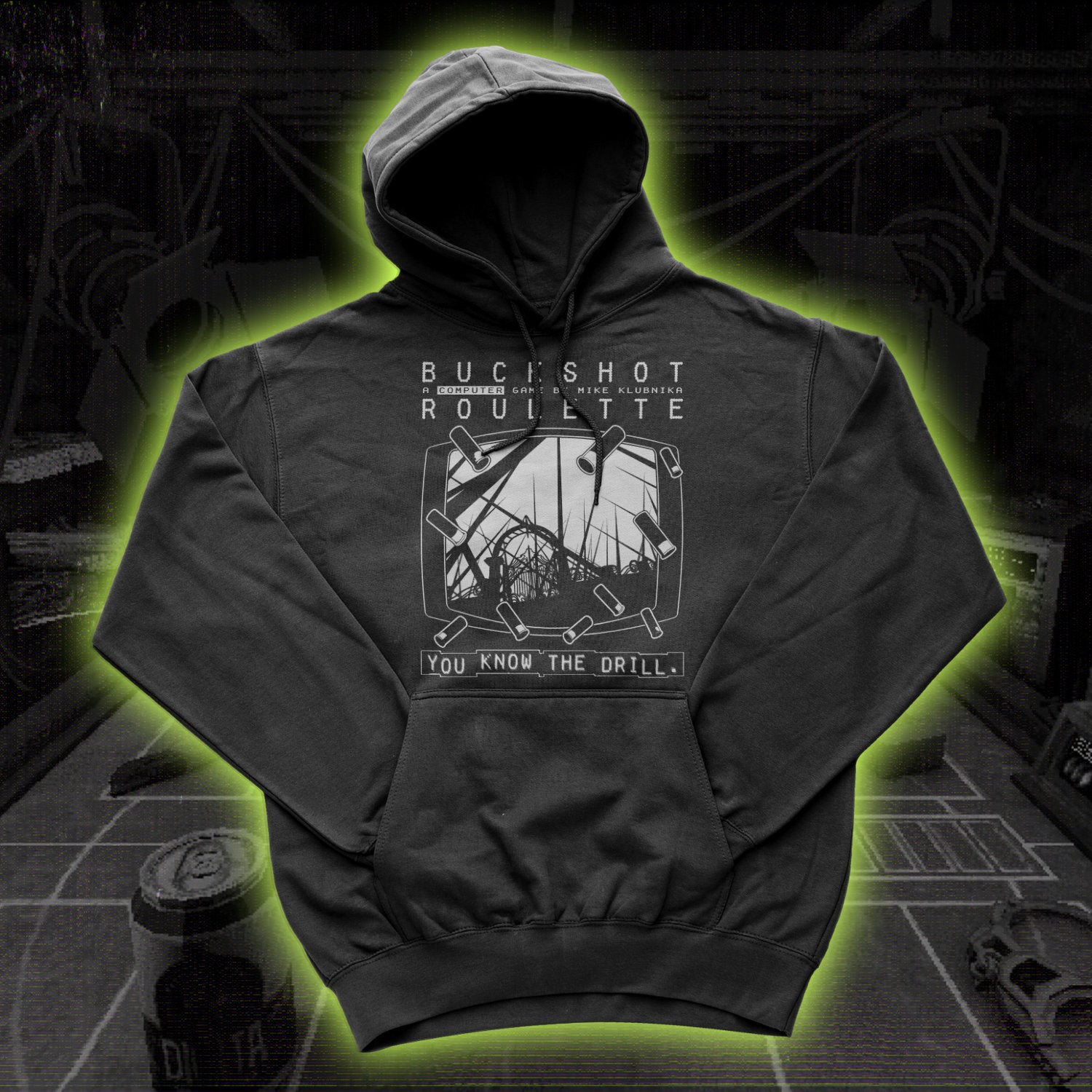 Black hoodie with graphic design and text on a dark background