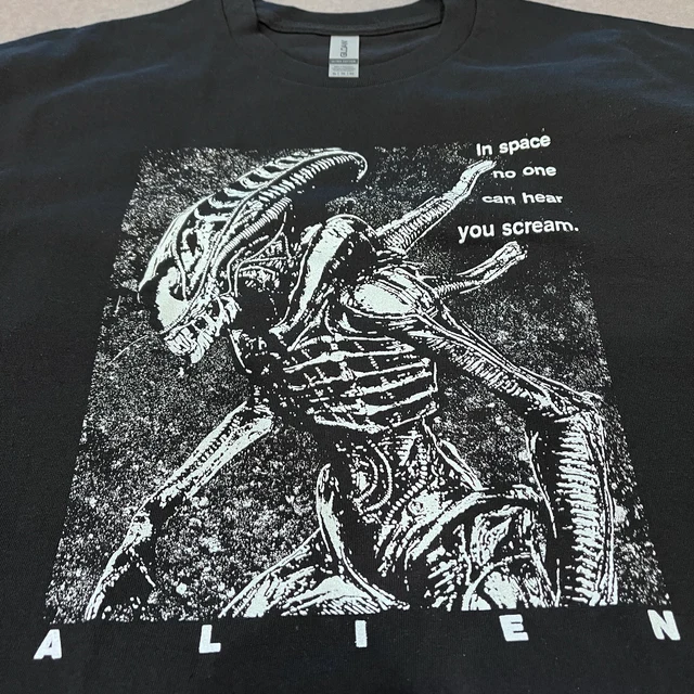 Black t-shirt with white alien graphic and text 'In space no one can hear you scream.'